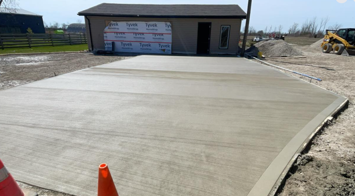 Garage pad — prep to finished concrete — after